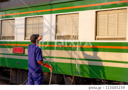 Employees are wiping, washing, inspecting and cleaning trains for use in transporting passengers Employees are wiping, washing, inspecting and cleaning trains for use in transporting passengers 113885239