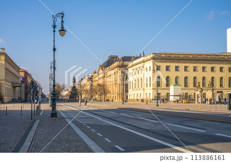 A view of the iconic Unter den Linden Street in Berlin, showcasing the equestrian statue of Frederick the Great under a clear sky. Berlin, Germany A view of the iconic Unter den Linden Street in Berlin, showcasing the equestrian statue of Frederick the Great under a clear sky. Berlin, Germany 113886161