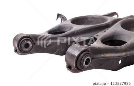 Curved metal rear chassis arm lever for spring with bushings - silent block on a white isolated background. Detail for suspension repair in a workshop or garage. 113887989