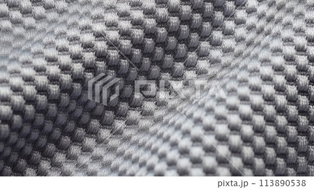 Grey soccer jersey with air mesh texture. Athletic wear backdrop Grey soccer jersey with air mesh texture. Athletic wear backdrop 113890538