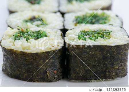 Japanese food restaurant, sushi maki gunkan roll plate or platter set. Sushi set and composition Japanese food restaurant, sushi maki gunkan roll plate or platter set. Sushi set and composition 113892576