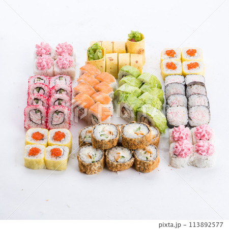 Japanese food restaurant, sushi maki gunkan roll plate or platter set. Sushi set and composition Japanese food restaurant, sushi maki gunkan roll plate or platter set. Sushi set and composition 113892577