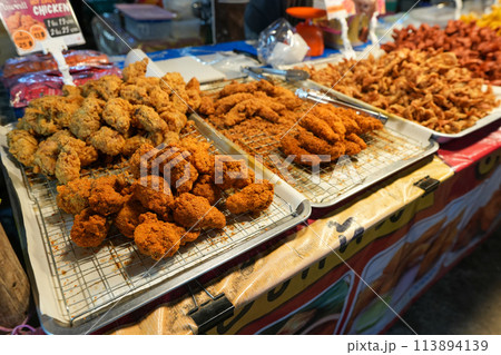 Fried chicken in the market,Food at the local market in Ao Nang City, Krabi Province 113894139