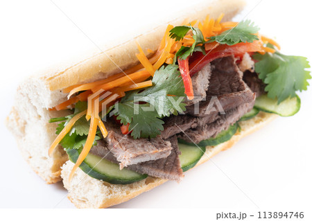Vietnamese banh mi sandwich isolated on white background Vietnamese banh mi sandwich isolated on white background 113894746