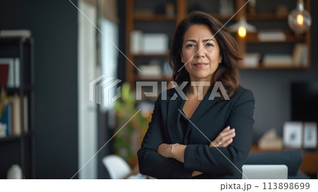 Confident Businesswoman in Modern Office Setting 113898699