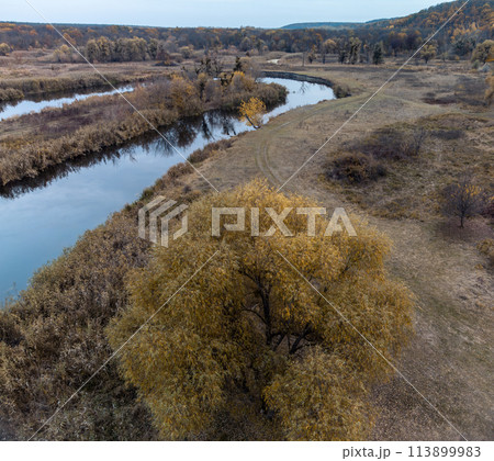 Aerial river curve in autumn valley 113899983