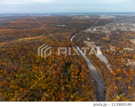 Autumn aerial river with wooded hills Autumn aerial river with wooded hills 113900146