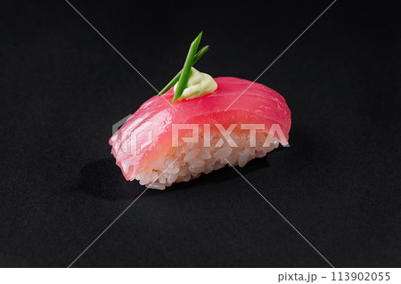 Gourmet tuna nigiri sushi with wasabi on black background 113902055