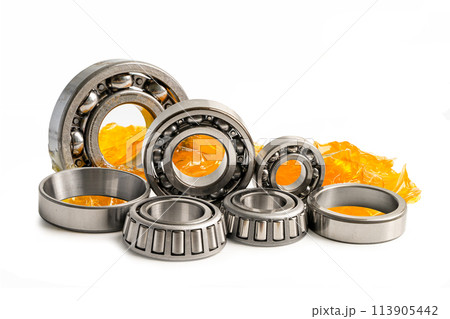 Ball bearing stainless with grease lithium machinery lubrication for automotive and industrial isolated on white background. Ball bearing stainless with grease lithium machinery lubrication for automotive and industrial isolated on white background. 113905442