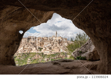 Scenic view of historic downtown with its cathedral, photo taken from a cave house, Southern Italy Scenic view of historic downtown with its cathedral, photo taken from a cave house, Southern Italy 113906024