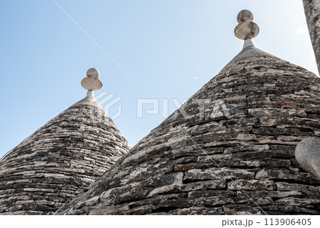 Typical pilled stone roof of a trullo in Alberobello, Southern Italy 113906405