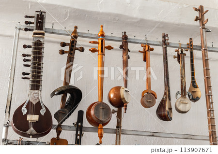 A variety of Central Asian stringed musical instruments A variety of Central Asian stringed musical instruments 113907671