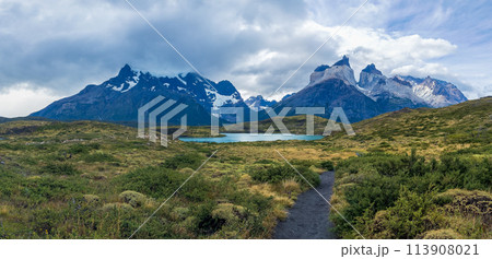 Scenic Path Leading to a Turquoise Mountain Lake 113908021