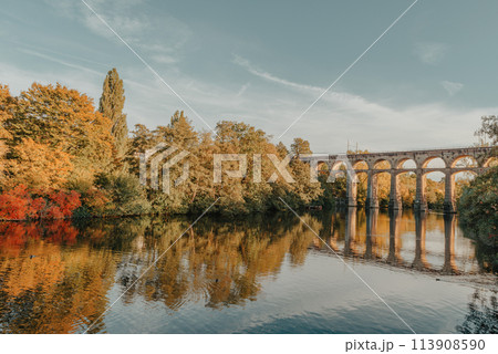 Railway Bridge with river in Bietigheim-Bissingen, Germany. Autumn. Railway viaduct over the Enz River, built in 1853 by Karl von Etzel on a sunny summer day. Bietigheim-Bissingen, Germany. Old Railway Bridge with river in Bietigheim-Bissingen, Germany. Autumn. Railway viaduct over the Enz River, built in 1853 by Karl von Etzel on a sunny summer day. Bietigheim-Bissingen, Germany. Old 113908590
