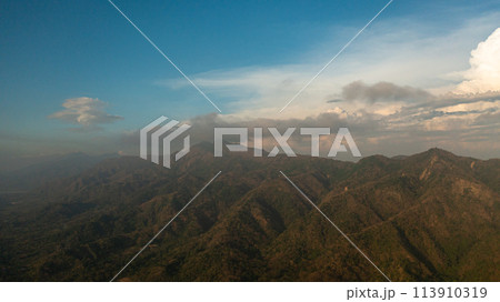 Top view of Sunset in the mountains against the blue sky and clouds. Philippines. 113910319