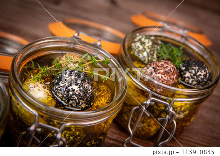 LABNEH CHEESE BOLLS WITH DRY MINT, BLACK AND WHITE SESAME, SUMAC AND ZAATAR IN A JAR WITH OLIVE OIL LABNEH CHEESE BOLLS WITH DRY MINT, BLACK AND WHITE SESAME, SUMAC AND ZAATAR IN A JAR WITH OLIVE OIL 113910835