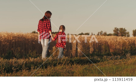 child girl daughter kid holding hand farmer mother, agriculture, business wheat field, friendly family, mother farmer holding her daughter hand wheat field, hands parent child, farmer with child 113911459
