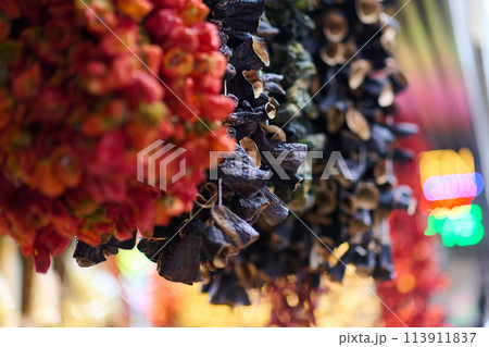 The dried marzipans hang in the shop 113911837