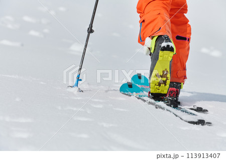 Close-Up of Ski Gear Ready for a Challenging Ascent 113913407