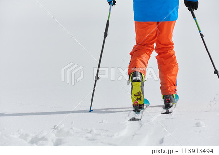 Close-Up of Ski Gear Ready for a Challenging Ascent 113913494