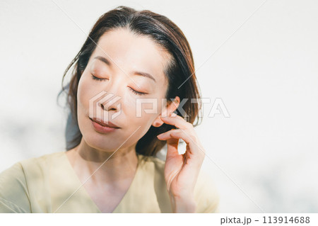 a forty-something woman a forty-something woman 113914688