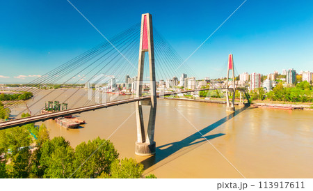 Bridge over river in Surrey to New Westminster. Sunny Day. Bridge over river in Surrey to New Westminster. Sunny Day. 113917611