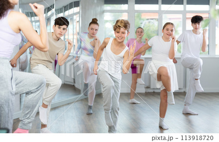 Group of boys and girls dancing dancehall Group of boys and girls dancing dancehall 113918720