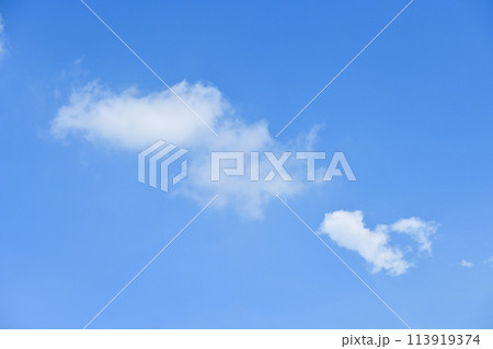 beautiful blue sky and white fluffy group of clouds with sunrise in the morning, natural background 113919374