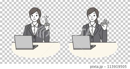 A woman in a suit pointing at a computer and making an OK pose 113919505