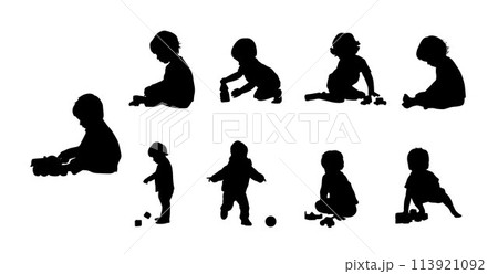 Kid playing with toys, Little boy playing block toys in home at nursery. Toddler having fun silhouette Kid playing with toys, Little boy playing block toys in home at nursery. Toddler having fun silhouette 113921092