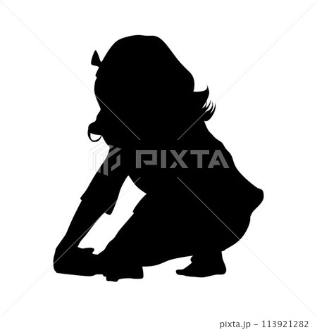 Kid playing with toys, little girl playing block toys in home at nursery. Toddler having fun silhouette Kid playing with toys, little girl playing block toys in home at nursery. Toddler having fun silhouette 113921282