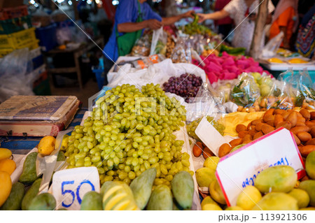 Green grapes and fruit stalls in the market Green grapes and fruit stalls in the market 113921306