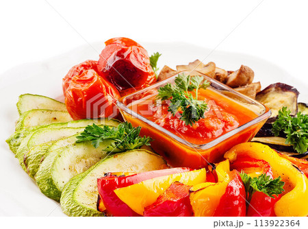 Grilled colorful vegetables on white plate Grilled colorful vegetables on white plate 113922364