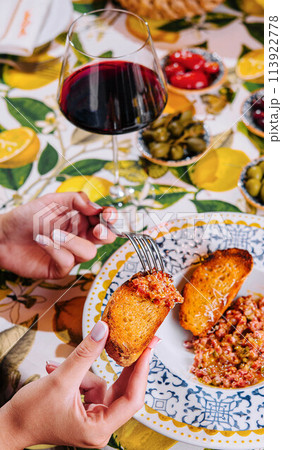 bruschetta with tomato and basil from and wine glass bruschetta with tomato and basil from and wine glass 113922778