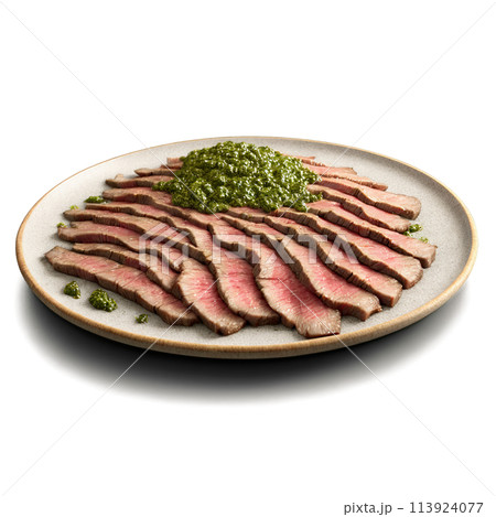 Flank steak thin slices cut against grain chimichurri drizzling Food and Culinary concept 113924077
