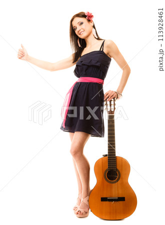 girl with guitar thumbing and hitch hiking isolated girl with guitar thumbing and hitch hiking isolated 113928461