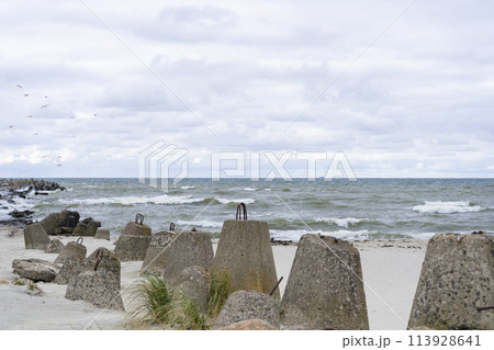 Storm on Baltic Sea. Breakwaters. Tetrapods. Baltiysk 113928641