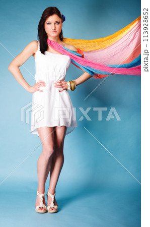 summer woman with colored shawl on blue 113928652