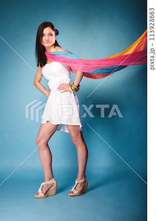 summer woman with colored shawl on blue 113928663