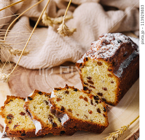 Freshly baked loaf of bread with raisins 113929883