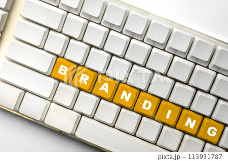 Closeup view of branding text on keyboard button Closeup view of branding text on keyboard button 113931787