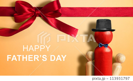 Red wooden peg doll with a black hat and bow tie with a Happy Father's Day message 113931797