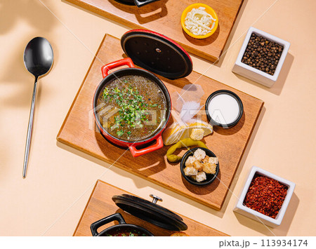 chicken soup on wooden tray top view chicken soup on wooden tray top view 113934174