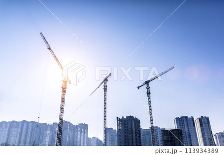 Construction industry building. Construction industry site with cranes, fittings and concrete. 113934389