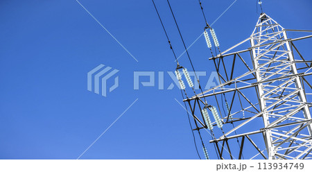 High voltage tower against the sky. Power transmission tower with wires 113934749