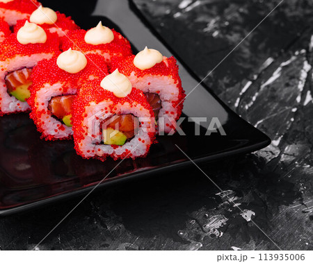 Macro shot of california maki sushi rolls with rice Macro shot of california maki sushi rolls with rice 113935006