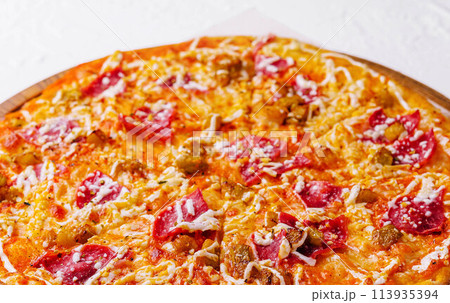 Pepperoni pizza with sausage close up 113935394