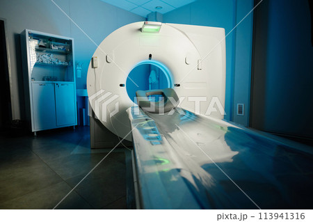 No people wide shot of modern CT scanner in hospital, copy space 113941316
