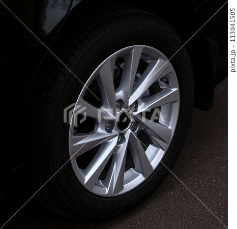 Car wheel background,  car elements close view 113941505