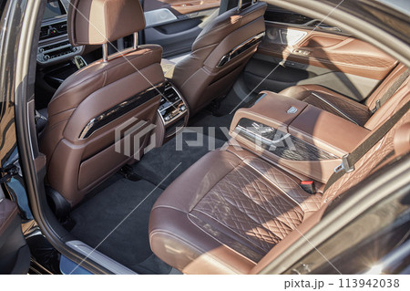 Inside moden car background, luxury car interior elements wallpaper. Black leather car interior 113942038